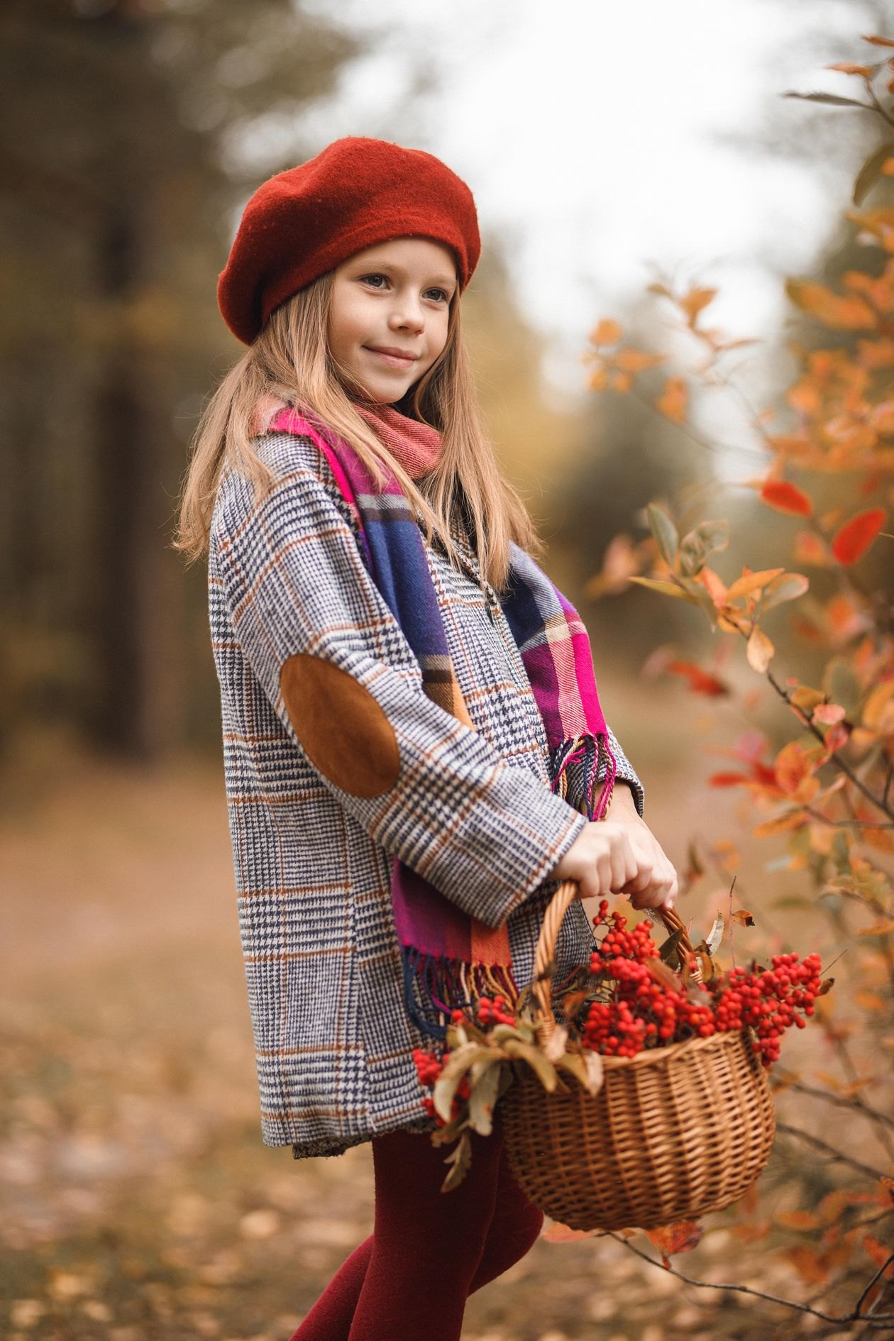 Child in a warm-toned coat. Placeholder, not the garment.