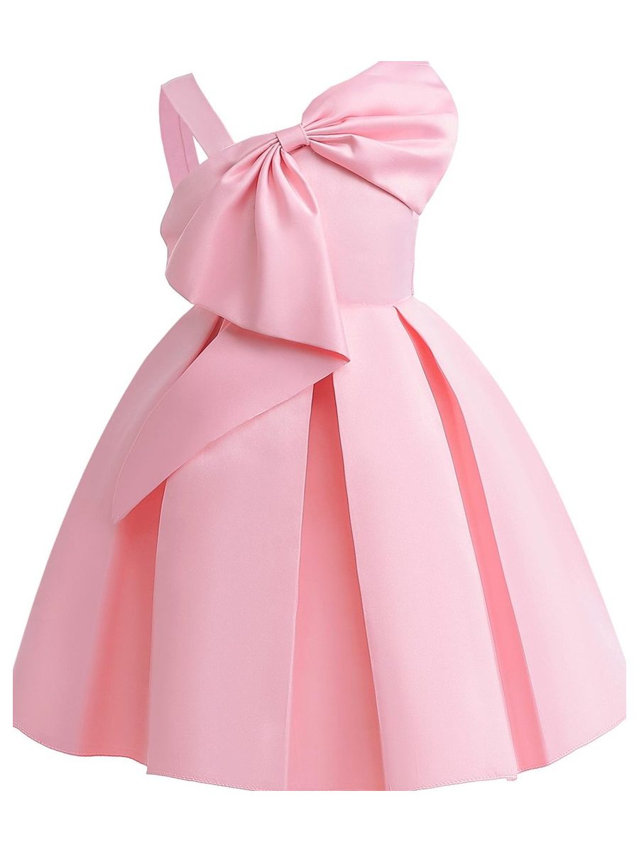 A blush satin dress with a large bow, laid flat. Not one of the six named pieces.